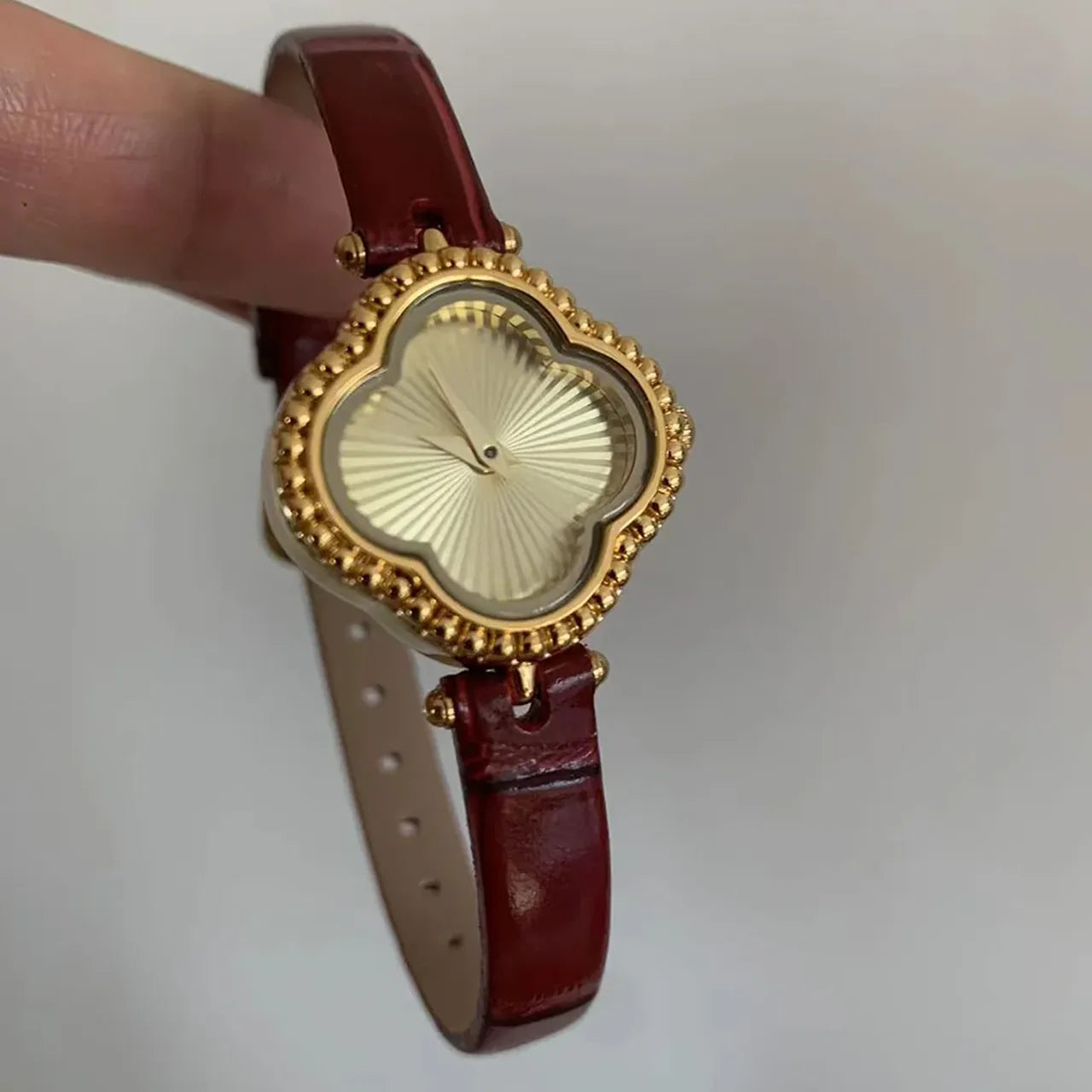 Vintage Luxury: Red Leather Clover Quartz Watch