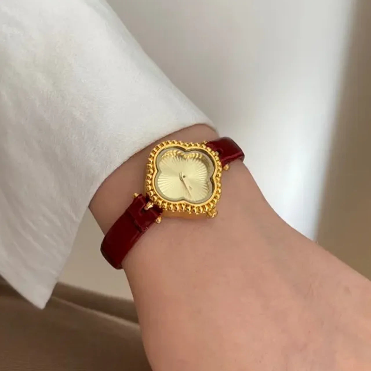 Vintage Luxury: Red Leather Clover Quartz Watch