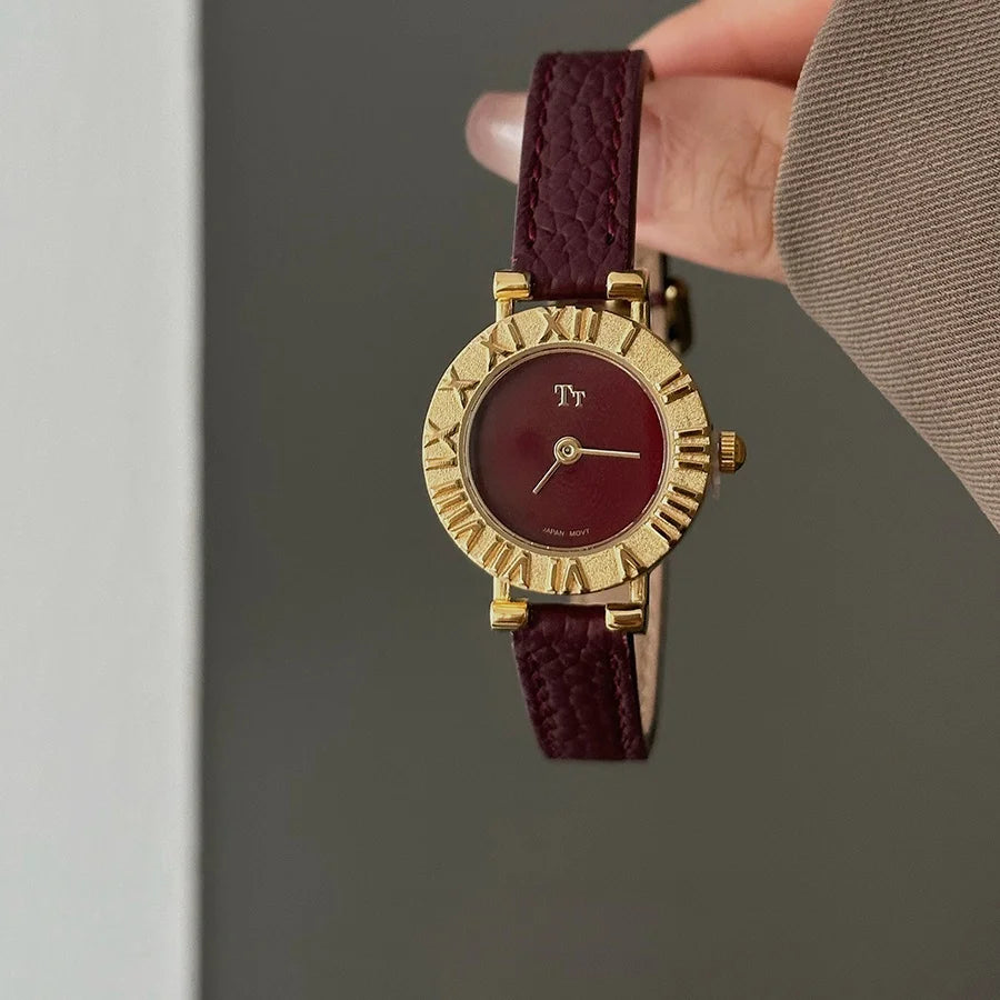 Crimson Charm Timepiece: Gold and Red Leather Watch